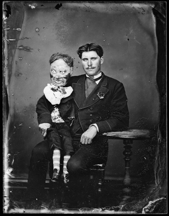 Man with his ventriloquist dummy c1870